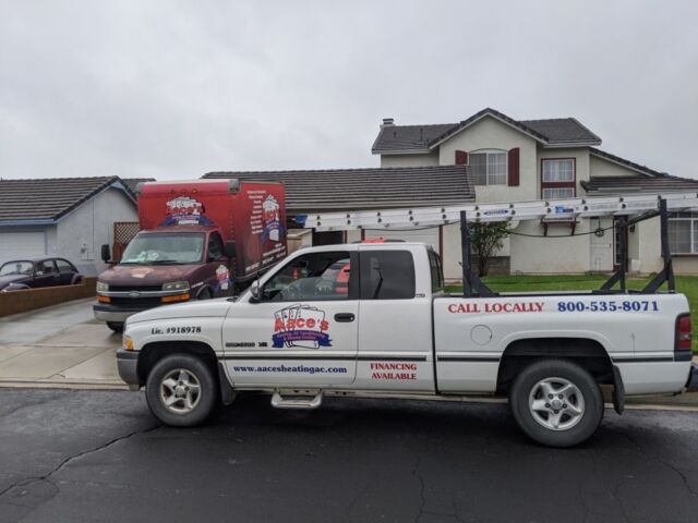 Aace's trucks outside of clients house